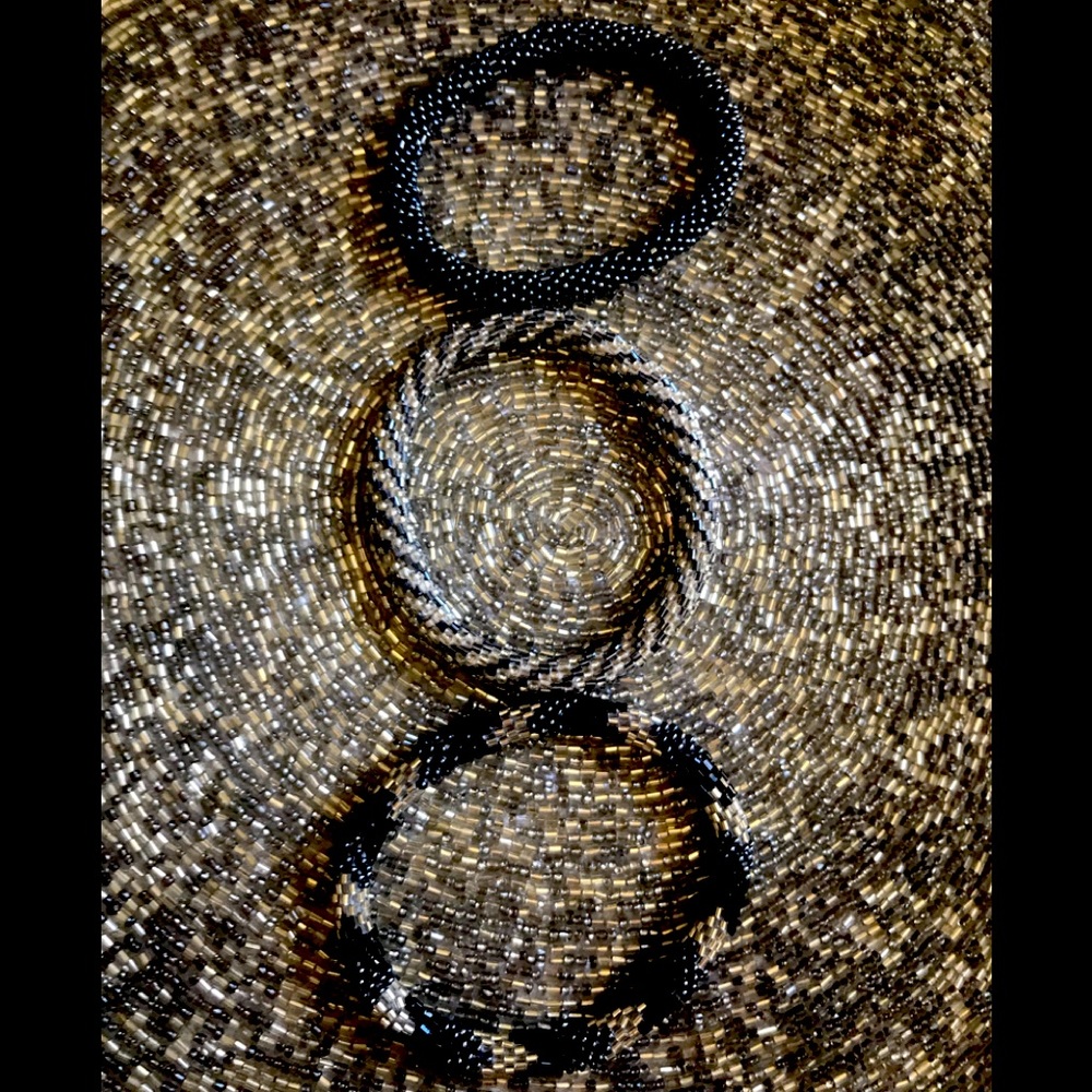 Aid Through Trade roll on bracelets